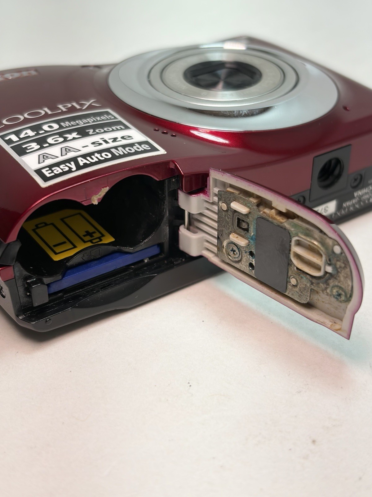 Nikon Coolpix L24 Red Compact Digital Camera 14MP w/ 3.6x BATTERY DOOR ISSUE