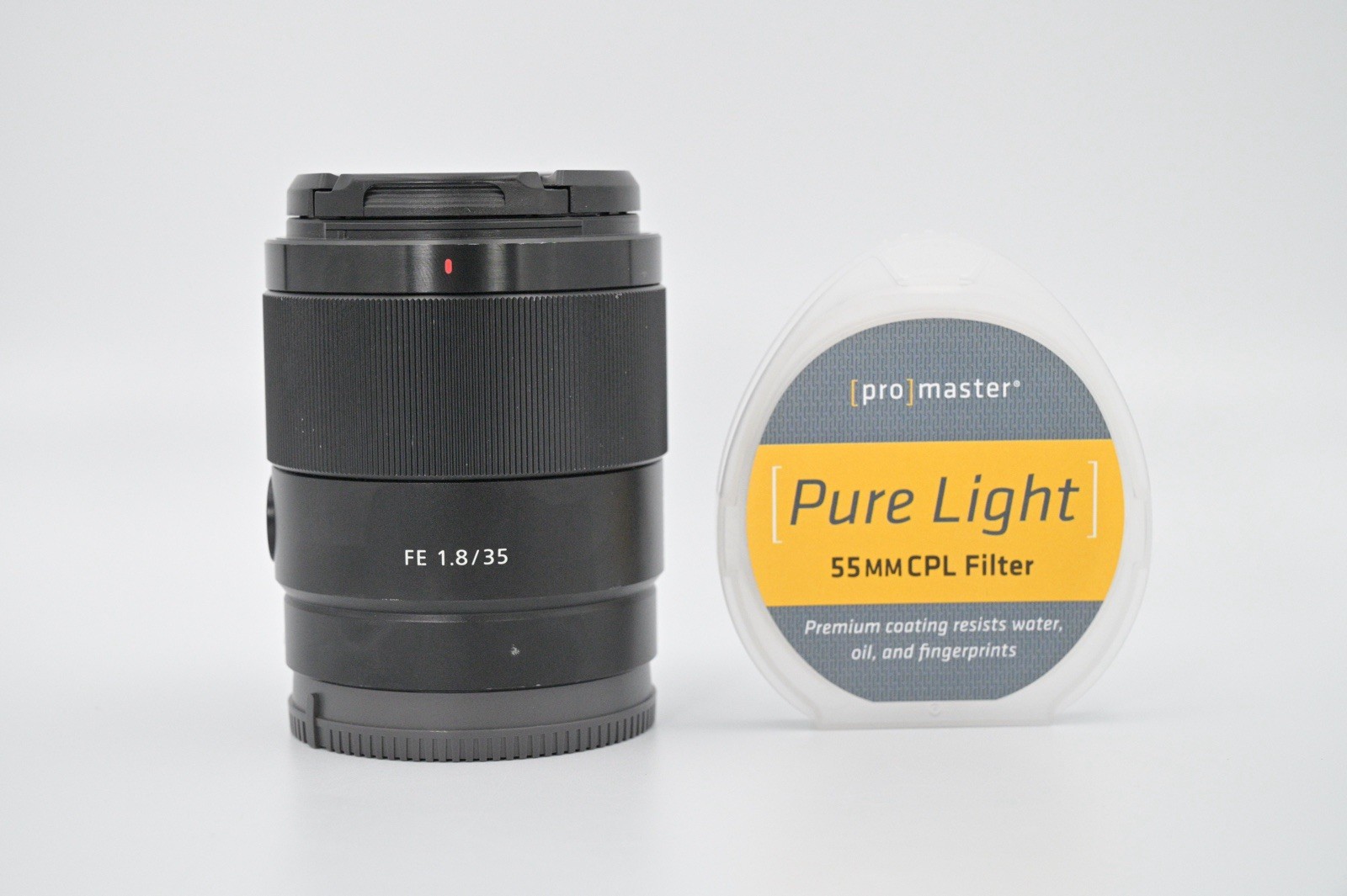 Sony FE 35mm f/1.8 Fixed Prime Lens SEL35F18F – Top & Bottom Cap & Filter READ