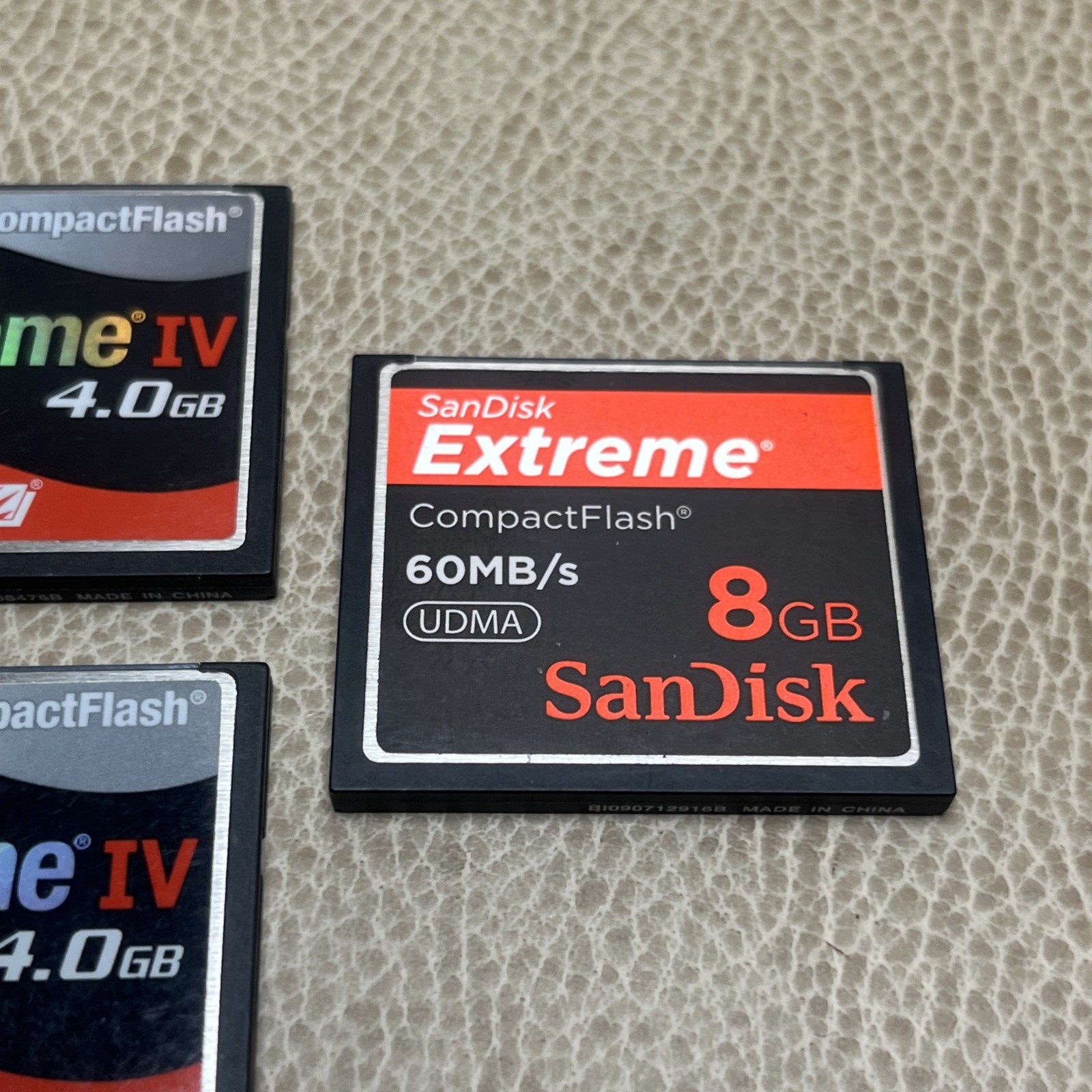 2 Sandisk 4GB Extreme IV Compact Flash Cards + 1 Extreme 8GB