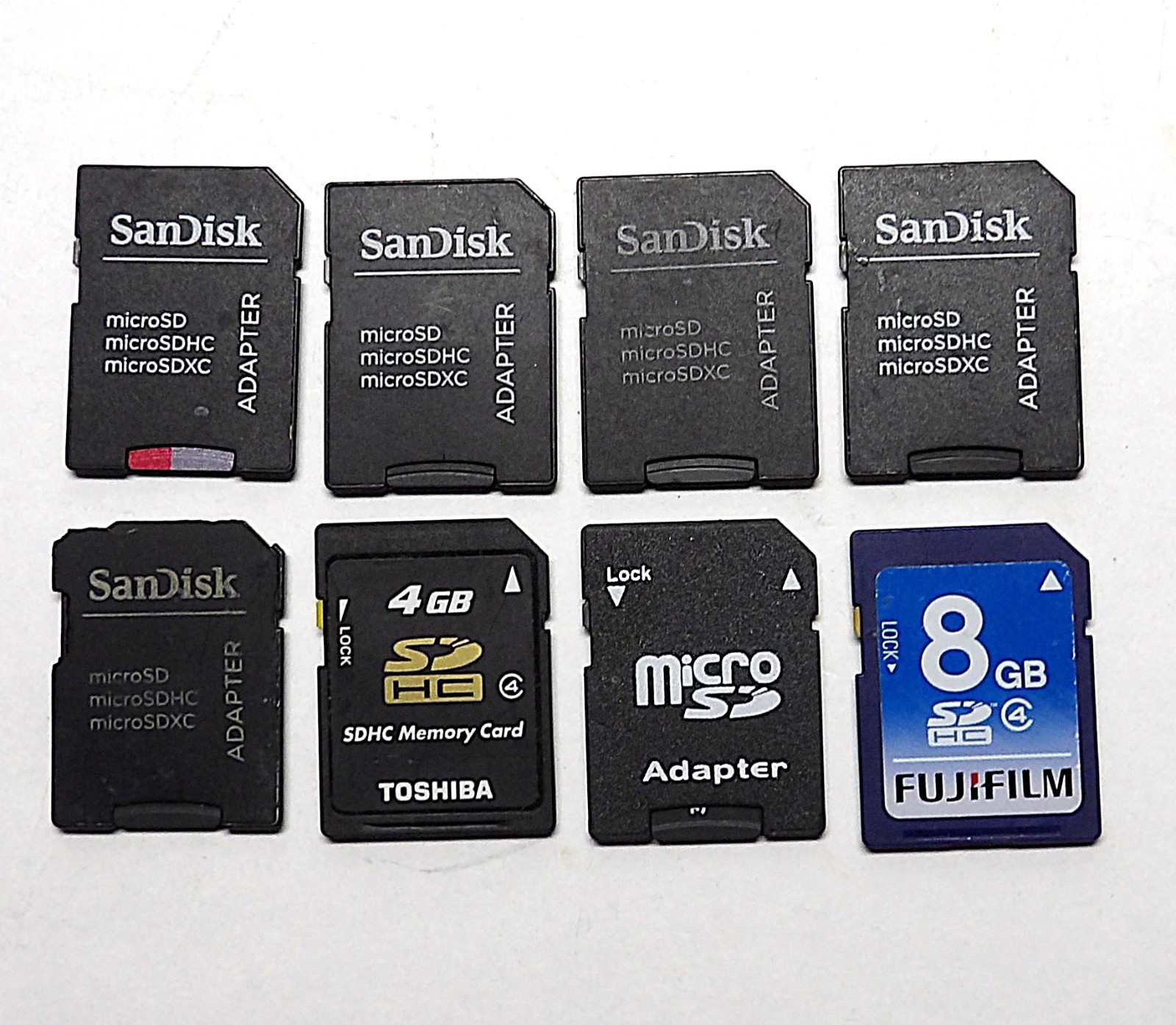 8 USED MEMORY CARDS & ADAPTORS SANDISK FUJIFILM AND MORE