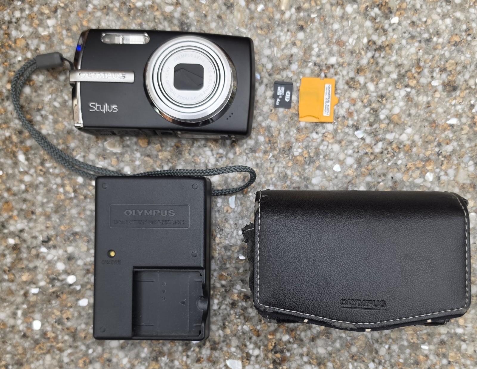 Olympus Stylus 1010 Digital Camera Black Bundle Charger Case MASD-1 Digicam