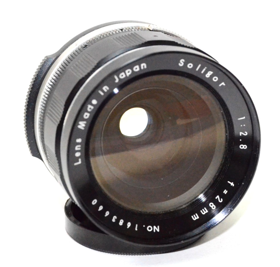 Soligor 28mm F/2.8 Manual Focus Lens T Mount w/ T to Pentax Screw Mount.