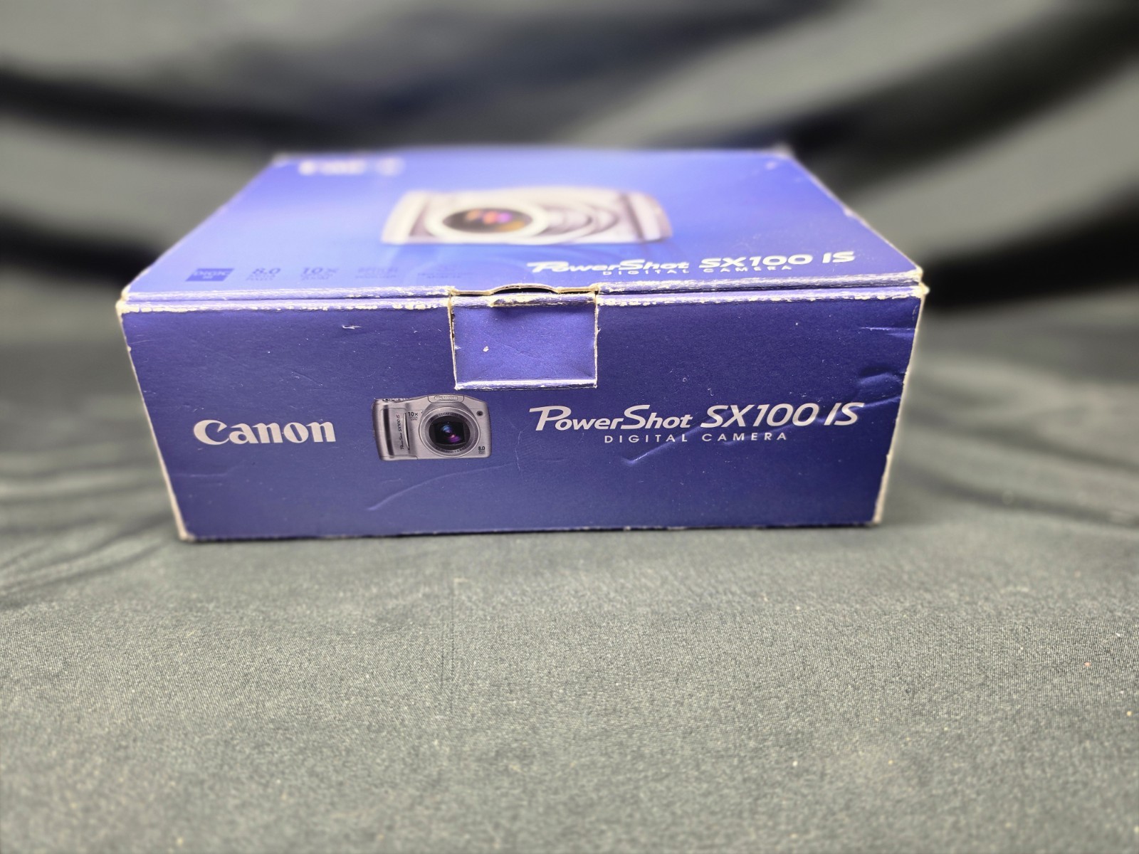 Canon PowerShot SX100 IS 8.0MP Digital Camera – Black