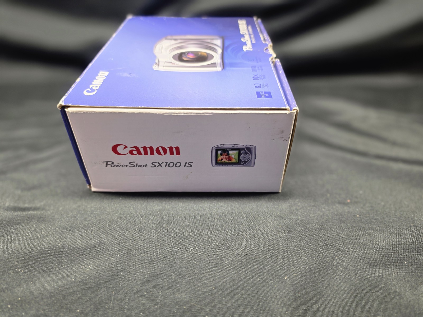 Canon PowerShot SX100 IS 8.0MP Digital Camera – Black