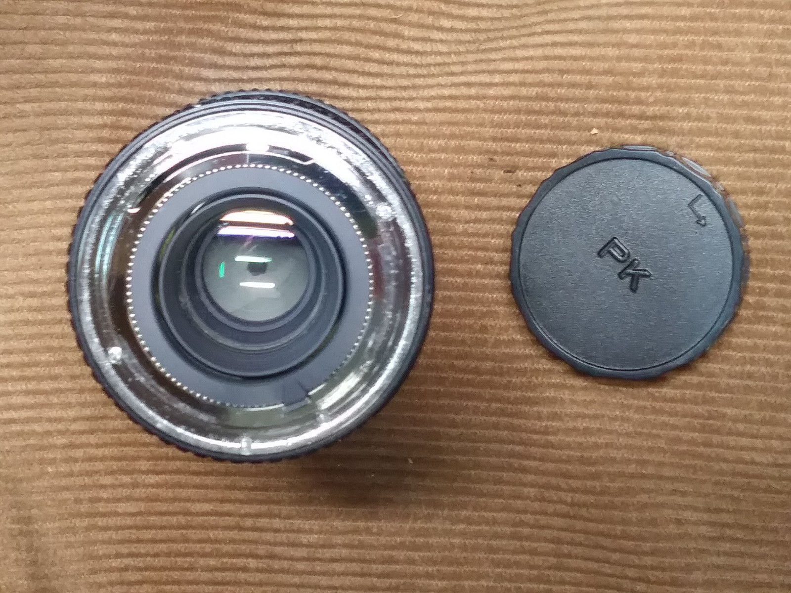 The Vintage Starblitz Auto Zoom 28-80mm f=3.5-4.5 Lens with a Konica “AR” mount