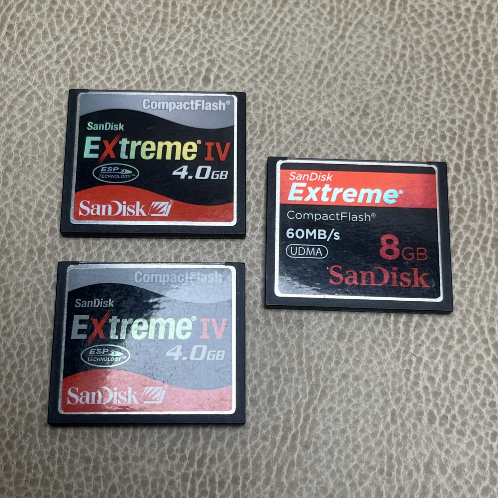2 Sandisk 4GB Extreme IV Compact Flash Cards + 1 Extreme 8GB
