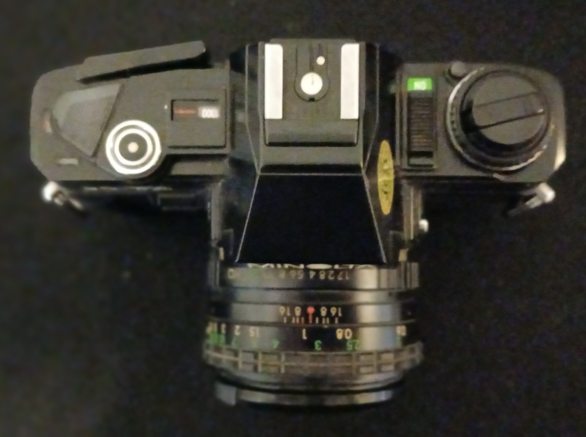 Minolta X-7A 35mm SLR Film Camera with 50mm f/1.7 Lens