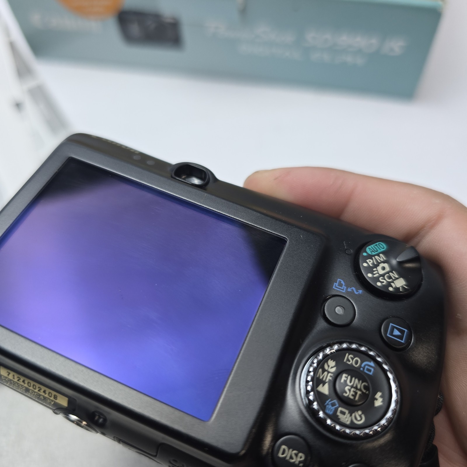 In Box – Canon PowerShot SD990 IS Digital ELPH Camera 14.7 MP 3.7X Zoom Camera