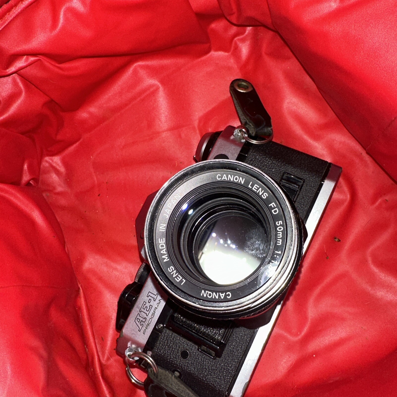 Canon AE-1 35mm SLR Film Camera silver 50mm 1.4 lens & More Marlboro Bag Manual