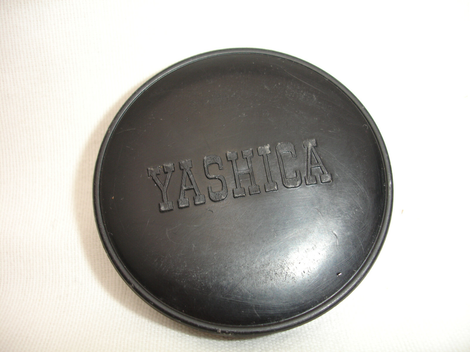 YASHICA 57mm front lens CAP, for 55mm filter threas lens . Slip ON, Long letters