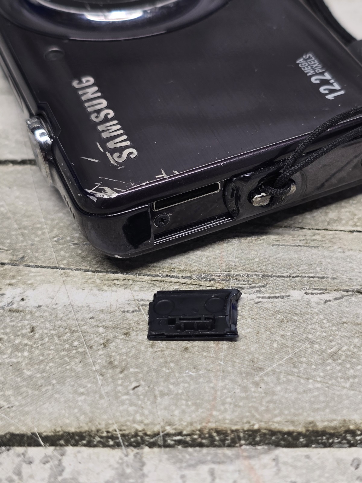 Samsung TL100 12.2MP Digital Camera – Black w/ Car Charger