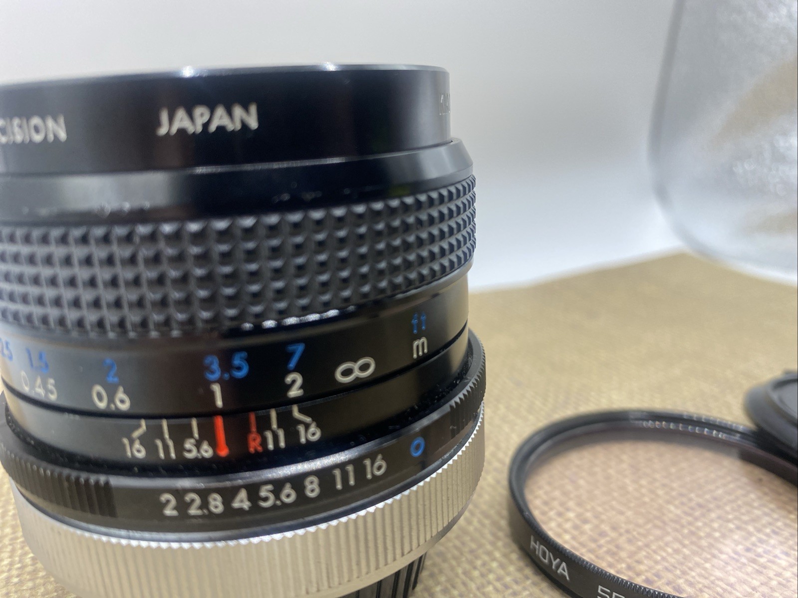Kiron 28mm f2 Nikon Ai mount #30106522 + Hoya 55mm Skylight 1B Filter