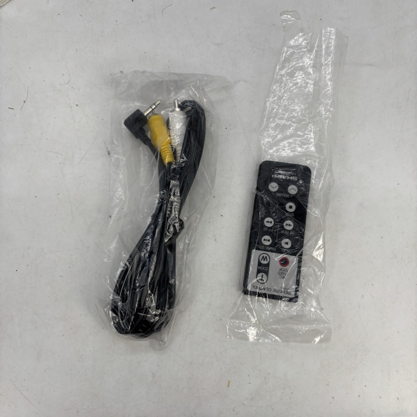 Sharp Viewcam VL-E760U & Charger, Carry Bag, and Film NEEDS NEW BATTERY