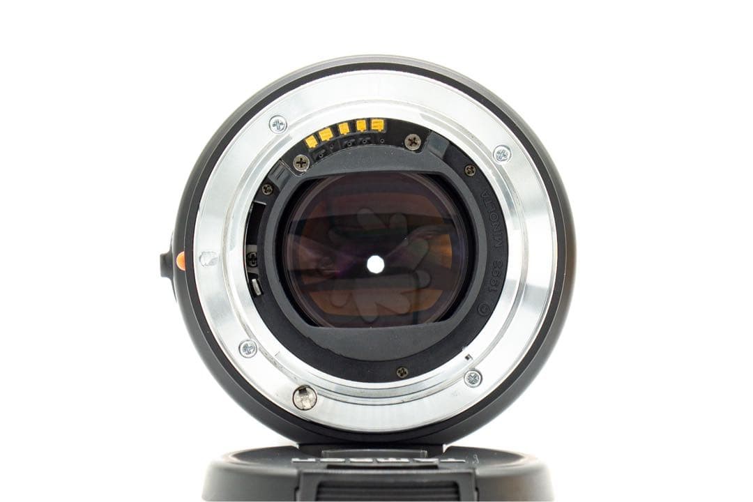 1-Month Warranty. Minolta 100 F2.8 Macro Lens. Functionality Checked.