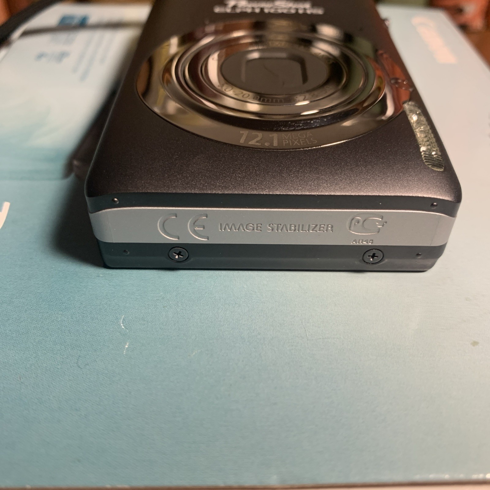 Canon PowerShot ELPH 100HS 12.1 MP 4x Zoom Gray PC1588, Comes W/ 2 Batteries
