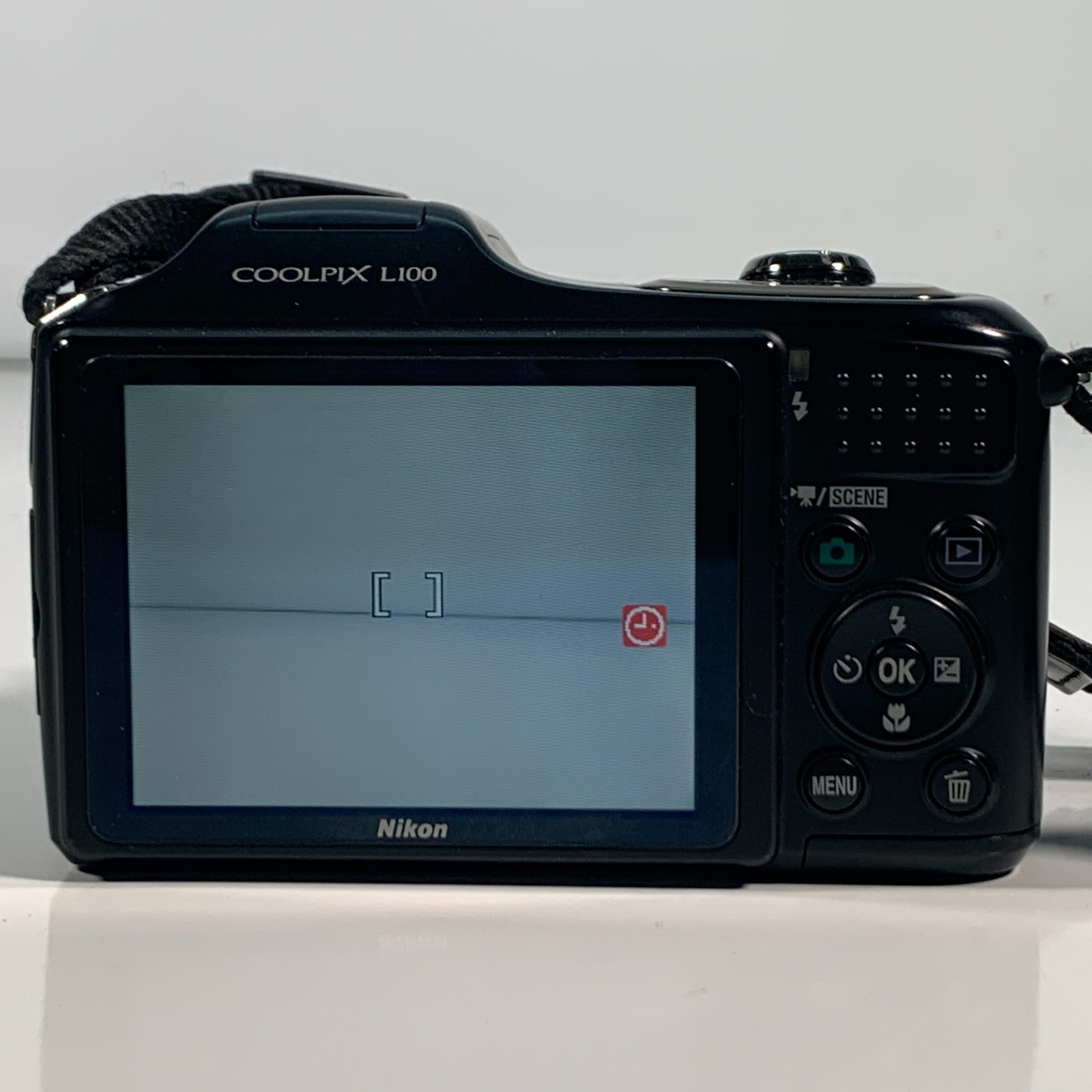 Nikon COOLPIX L100 10.0MP 15x Zoom Digital Battery Operated Camera Used Read