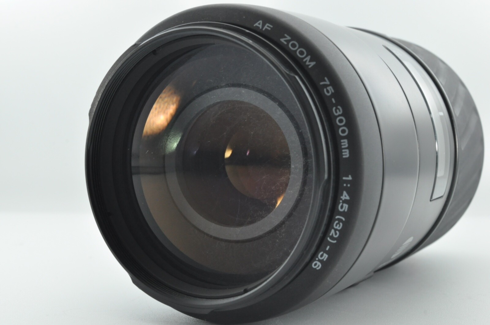 MINOLTA AF ZOOM 75-300mm f/4.5-5.6 α A mount Made in Japan Mold: None Fog: None