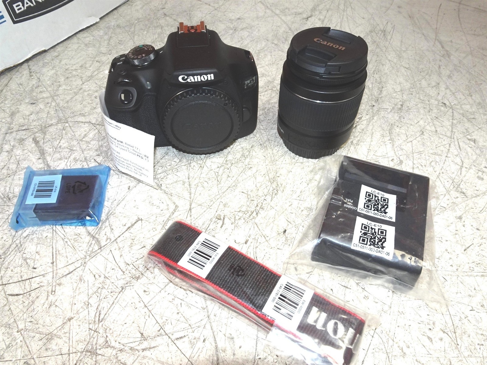 Canon EOS Rebel T7 DSLR 24.1MP w/ EF-S 18-55mm III Lens and Battery