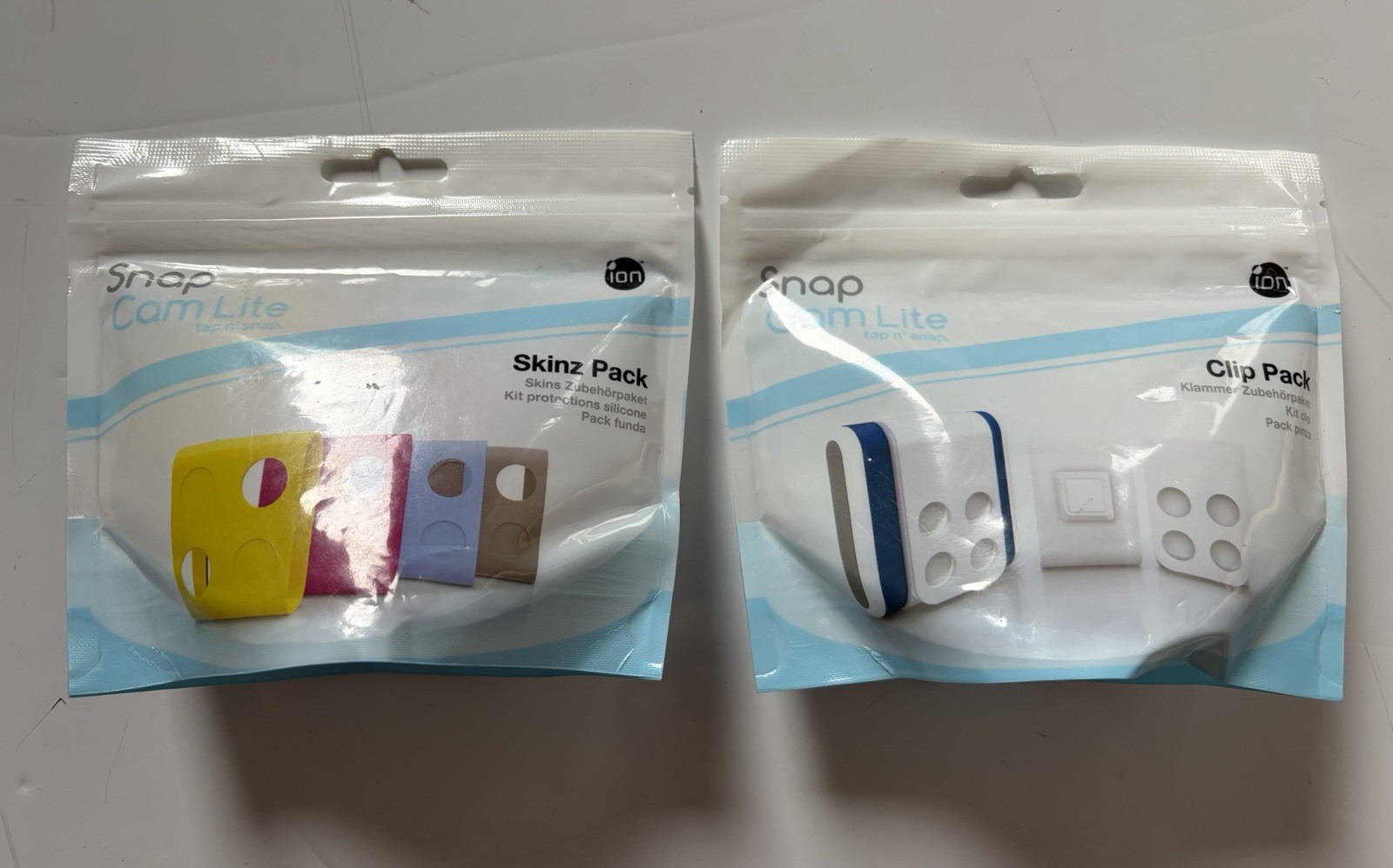 LOT OF 2 ion Snap Cam Lite tap n’ Snap Clip & Skinz Pack Only – no Camera