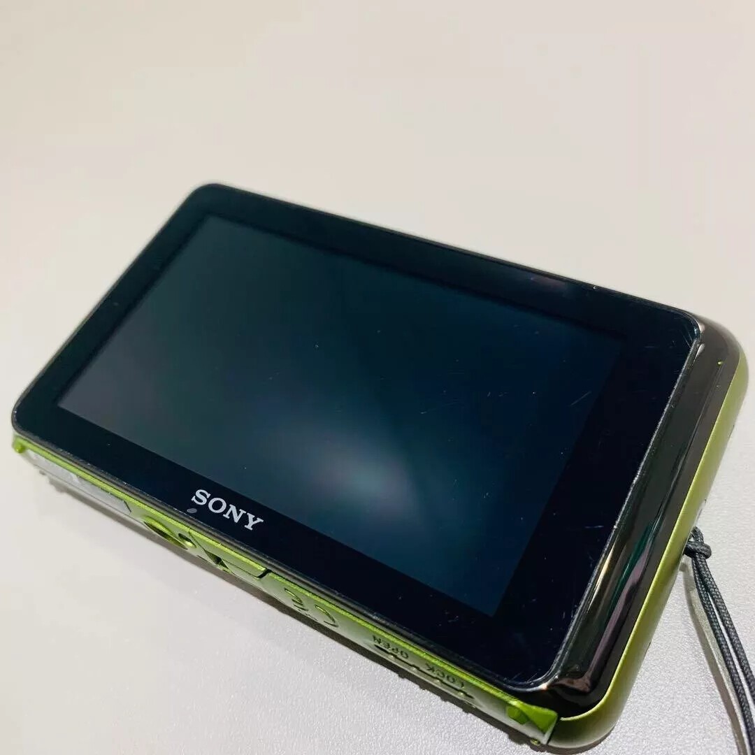 Green Sony Cyber-Shot DSC-T99 14.1MP Digital Camera Touch Screen Rare English