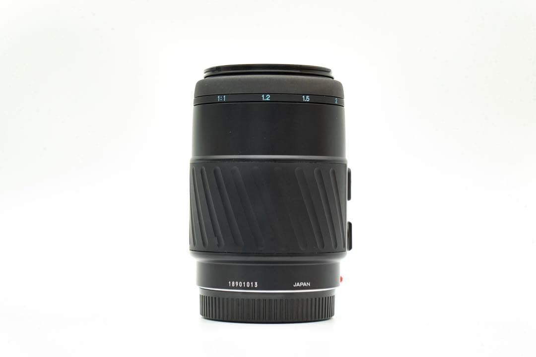 1-Month Warranty. Minolta 100 F2.8 Macro Lens. Functionality Checked.