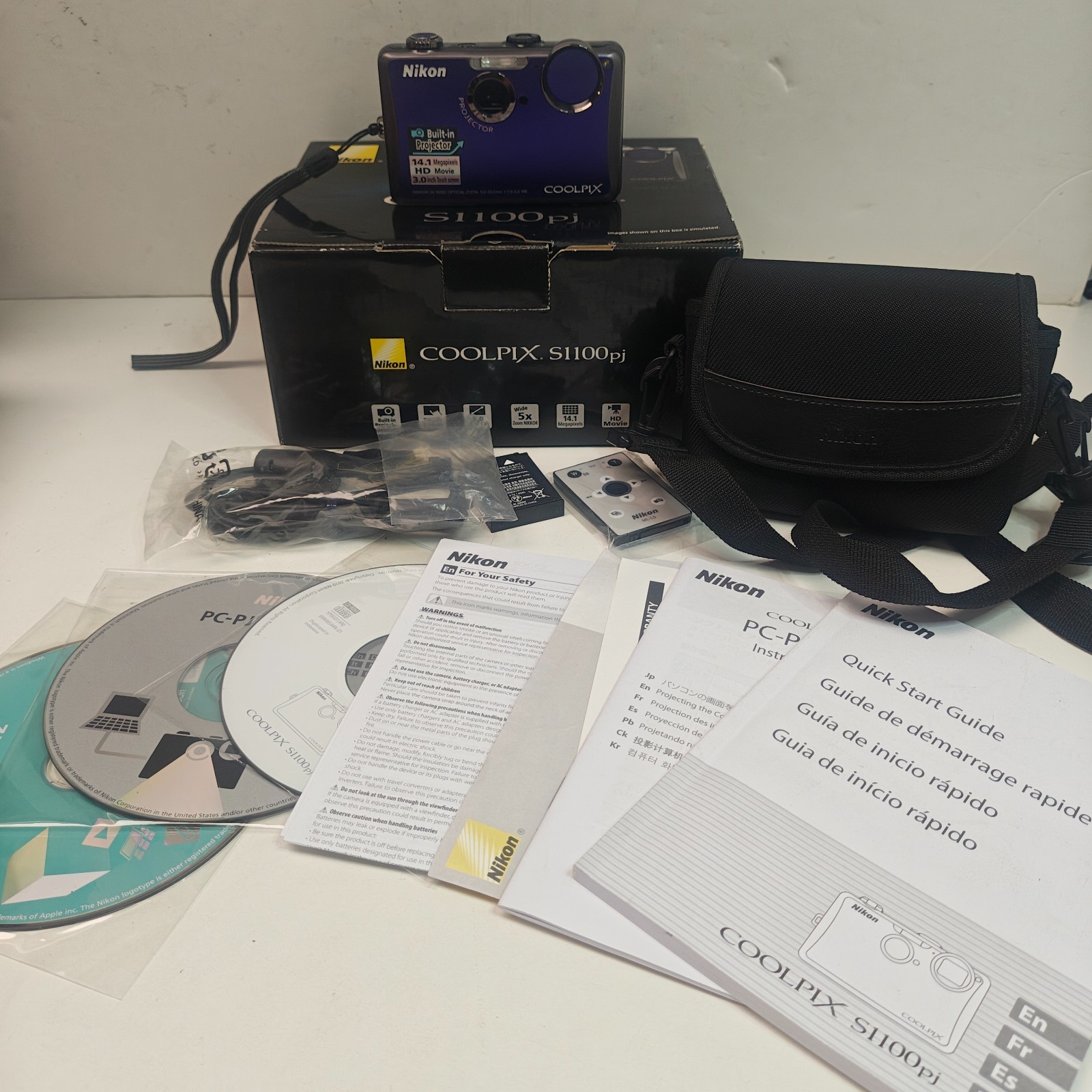 Nikon Coolpix S1100pj 14.1MP Digital Camera Purple Projector CIB Tested W/ Box