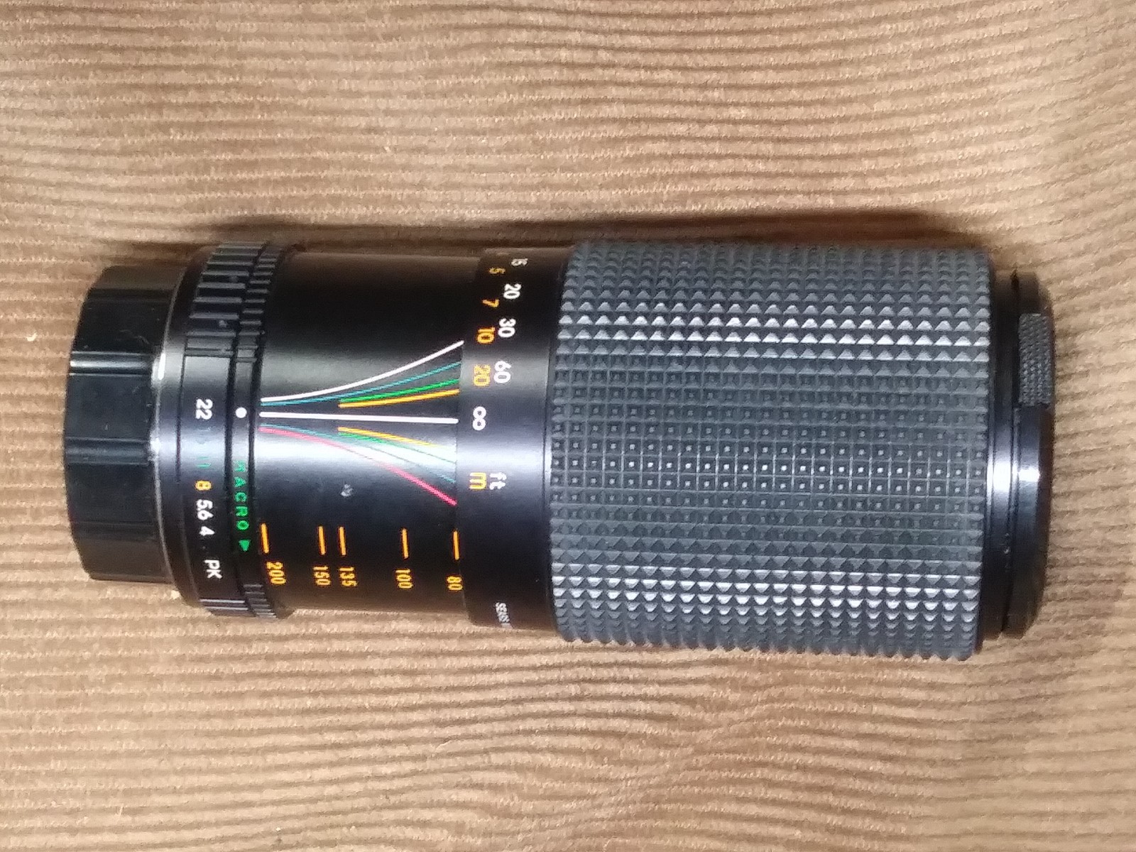 The Vintage Starblitz Auto Zoom 28-80mm f=3.5-4.5 Lens with a Konica “AR” mount