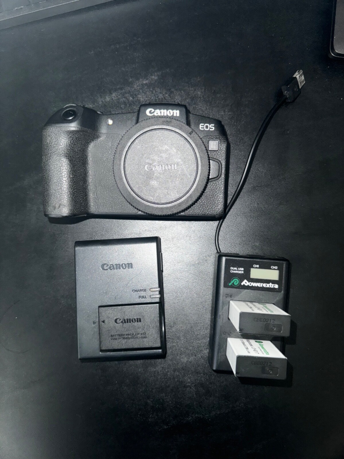 Canon EOS RP body only with 2 chargers and 3 batteries