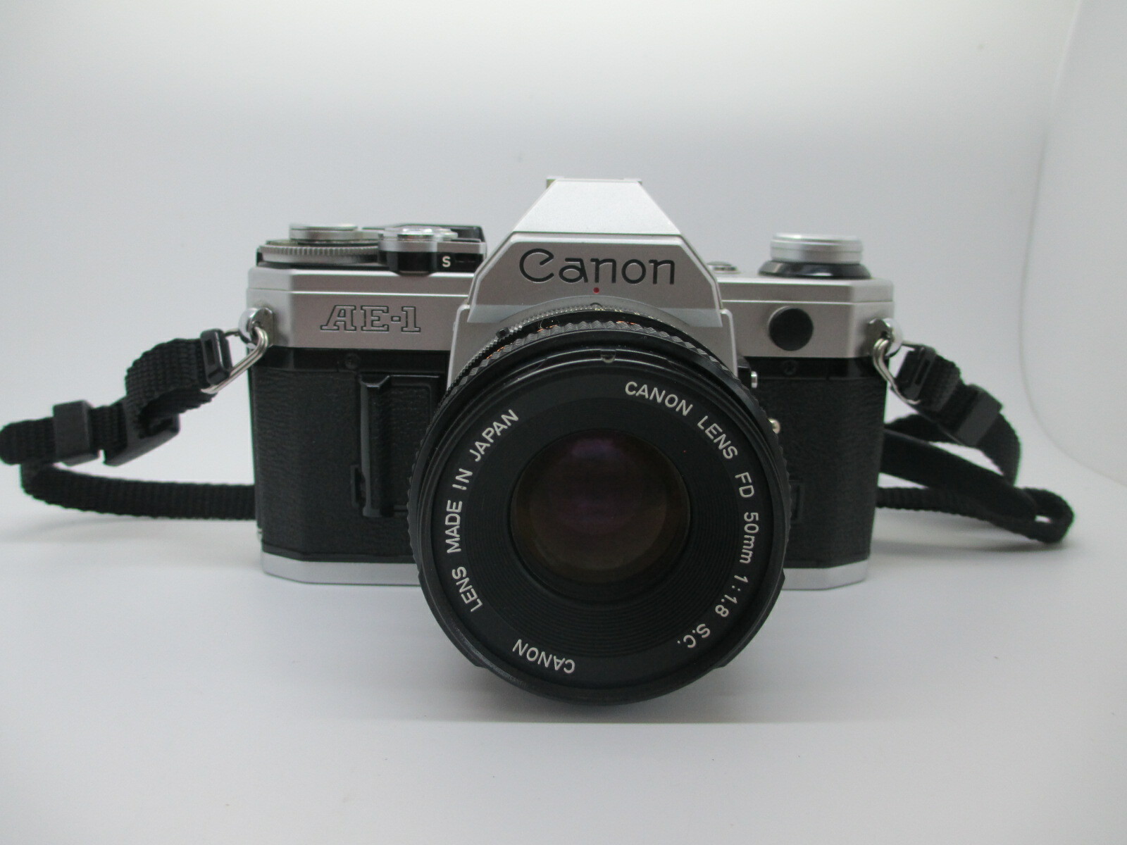 Canon AE-1 35mm SLR Film Camera with Canon 50mm f/1.8 FD Lens – WORKING PERFECT!