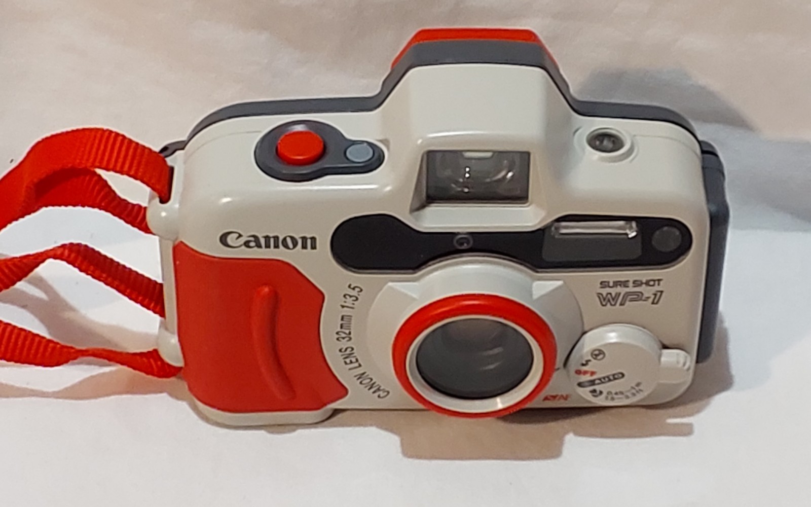 Canon Sure Shot WP-1 35mm Weatherproof Point & Shoot Camera With Case And Strap