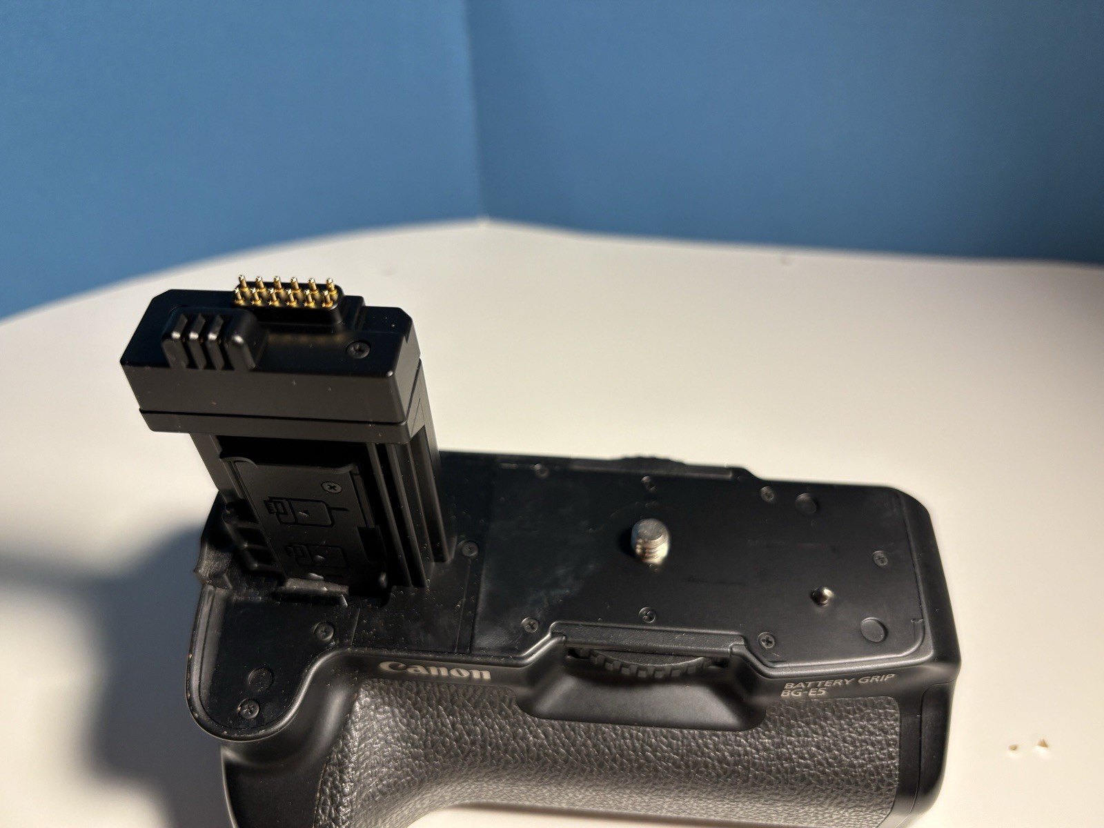 Canon Rebel XSI DSLR Camera With Battery Grip BG-E5, Strap, Charger, Body Cap.
