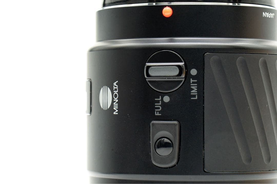 1-Month Warranty. Minolta 100 F2.8 Macro Lens. Functionality Checked.