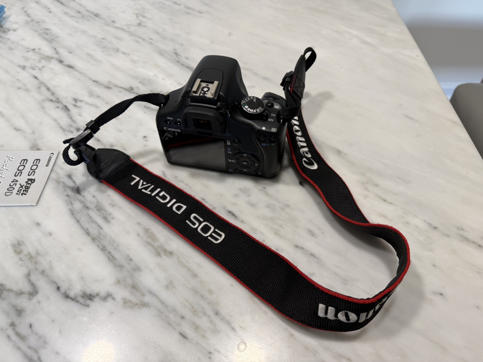 CANON EOS Rebel xsi 450D (body only), w/ manual, Canon battery and charger