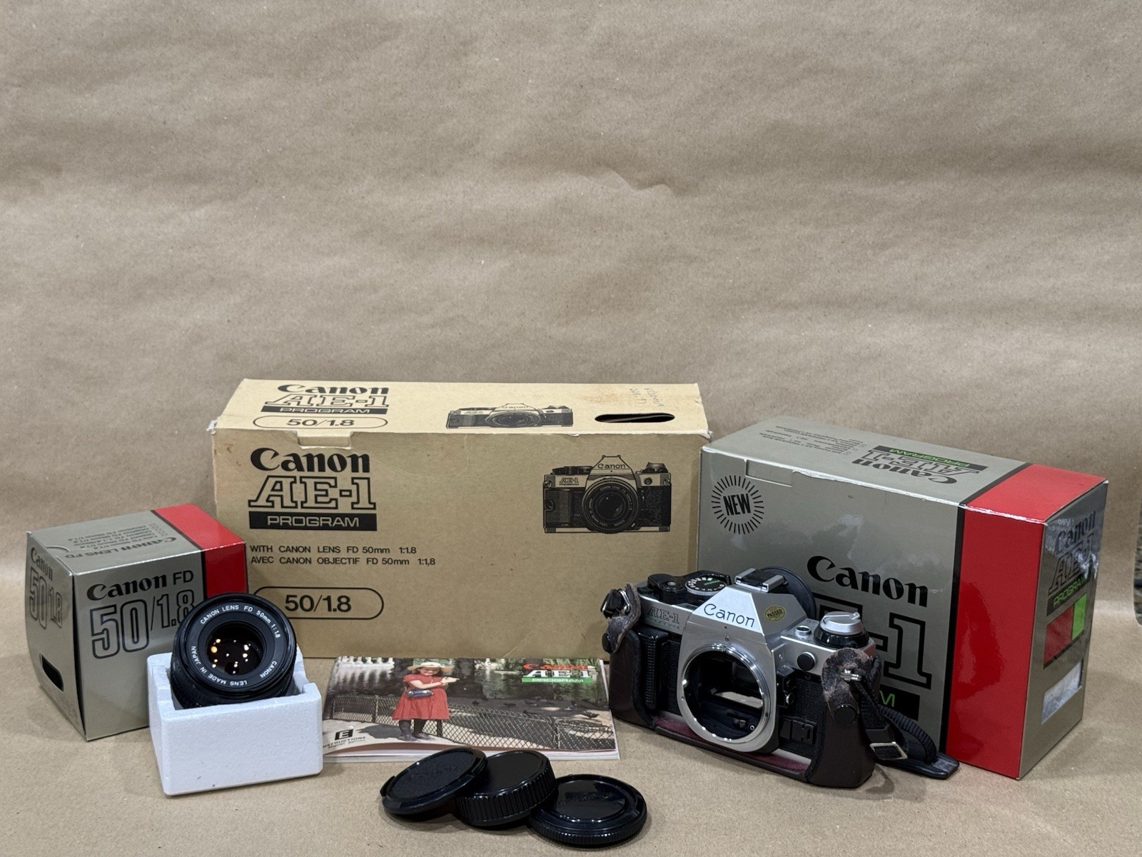 Canon AE-1 Program Camera w/ 50mm f/1.8 FD Lens in the original Box – Nice !