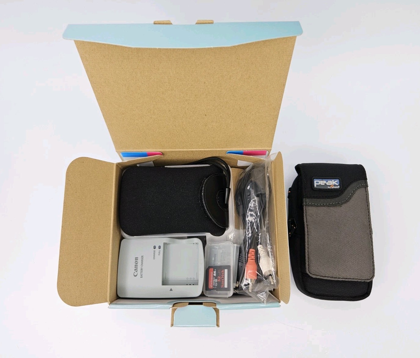 Canon PowerShot SD4000 IS Digital Camera w/Box 32GB SD Card & Case, Cables MINT!