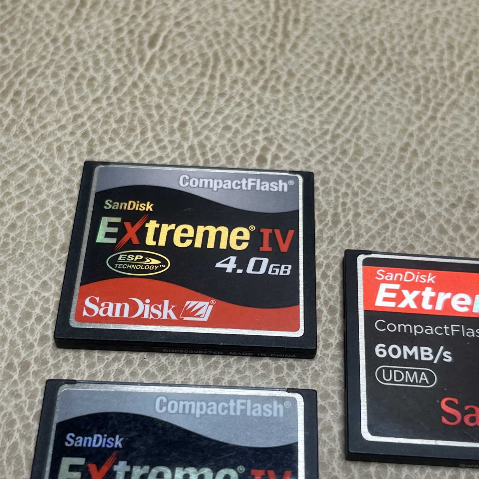 2 Sandisk 4GB Extreme IV Compact Flash Cards + 1 Extreme 8GB