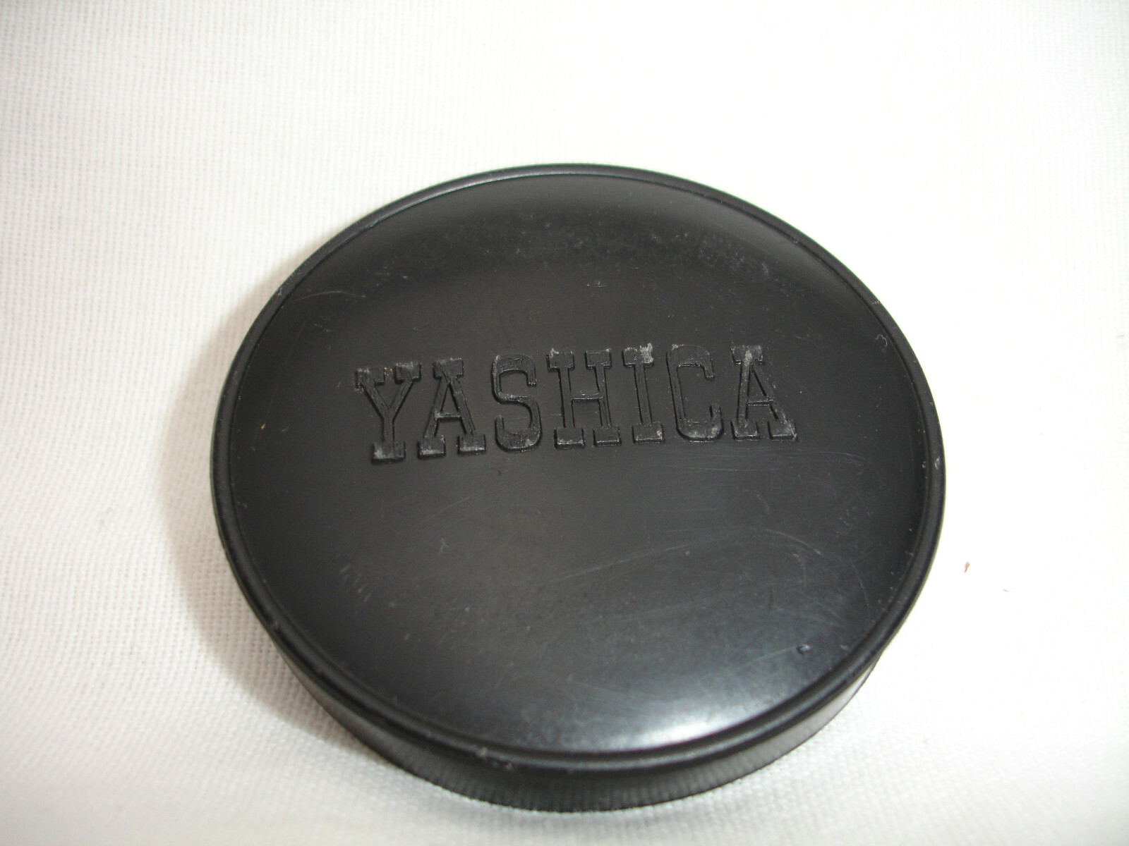 YASHICA 57mm front lens CAP, for 55mm filter threas lens . Slip ON, Long letters