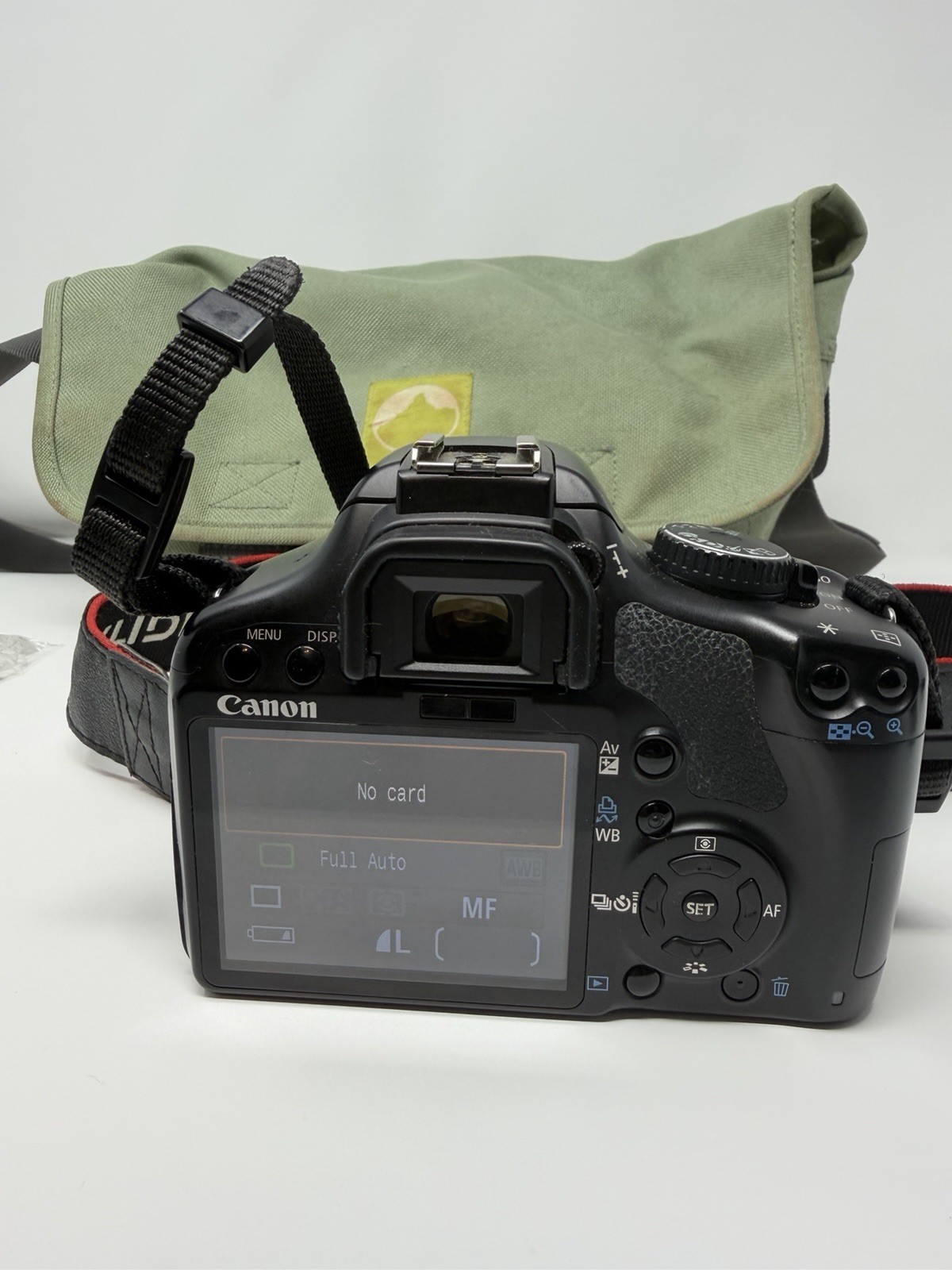 Canon EOS Rebel XSi 12.2MP Digital SLR Camera Body Charger Manual Bag