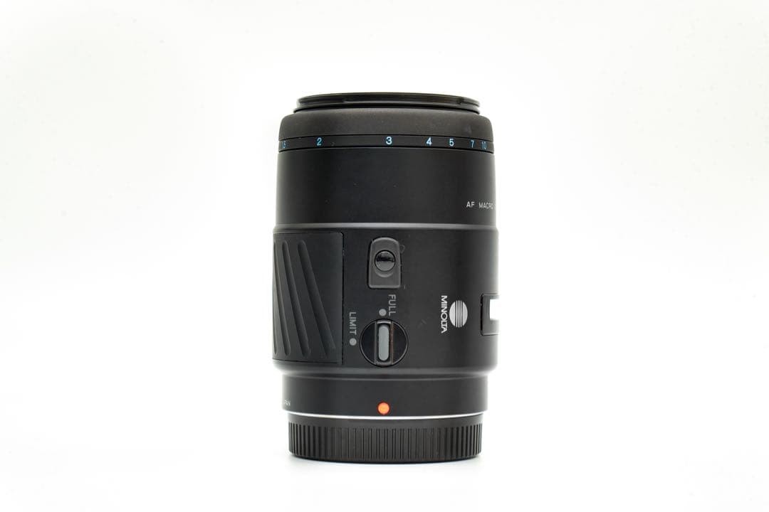 1-Month Warranty. Minolta 100 F2.8 Macro Lens. Functionality Checked.