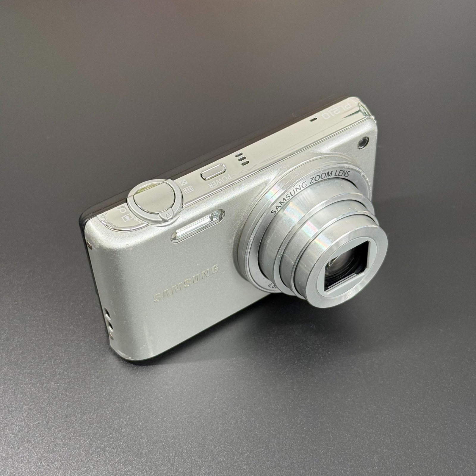 Samsung PL210 Digital Camera 14.2MP 10x Optical Zoom English Language Auto Focus