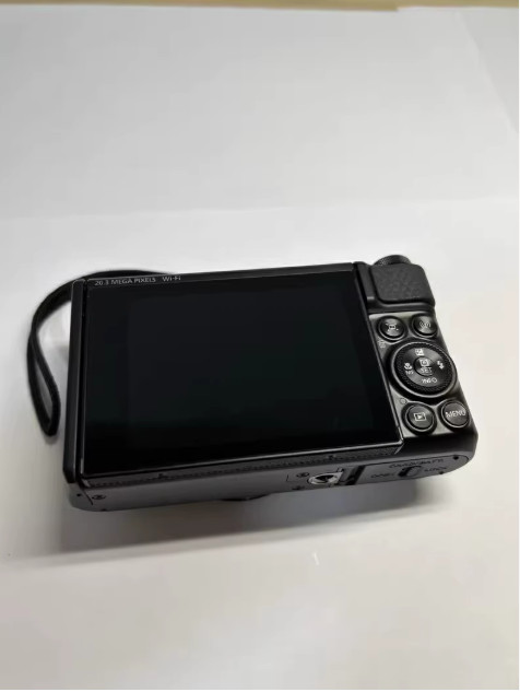 Canon SX740 40x zoom 4K video WiFi flip screen compact camera
