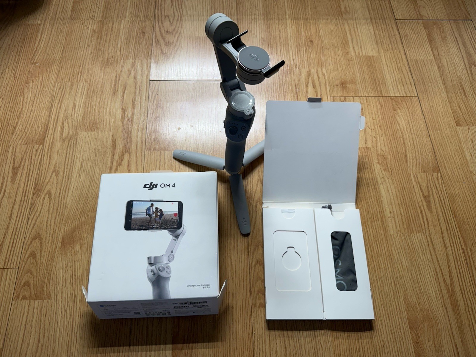 DJI OM 4 3-Axis Smartphone Gimbal Stabilizer with Tripod, Magnetic Design