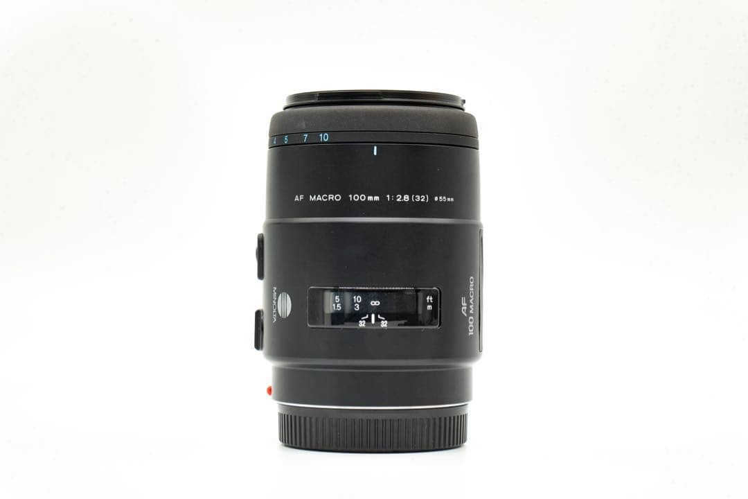 1-Month Warranty. Minolta 100 F2.8 Macro Lens. Functionality Checked.