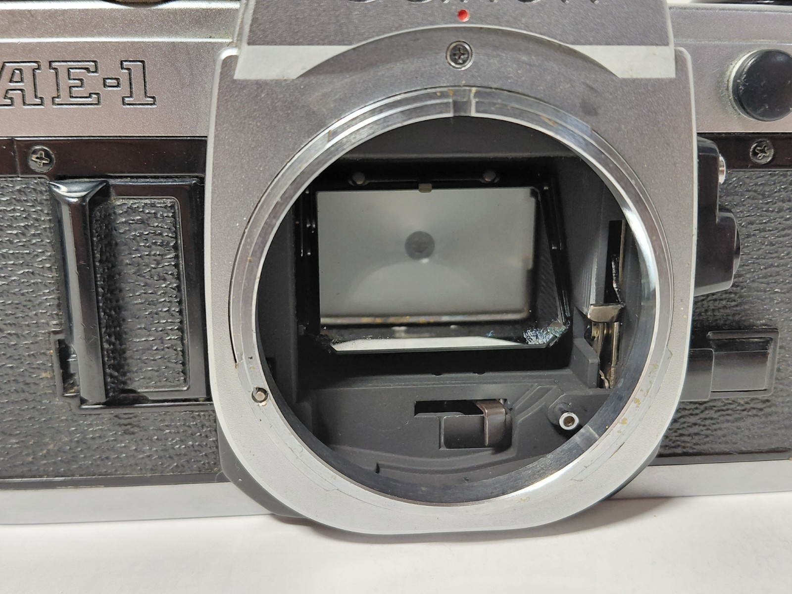 Canon AE-1 Silver 35mm Film Camera w/ Canon FD 28mm F/2.8 Lens – Tested