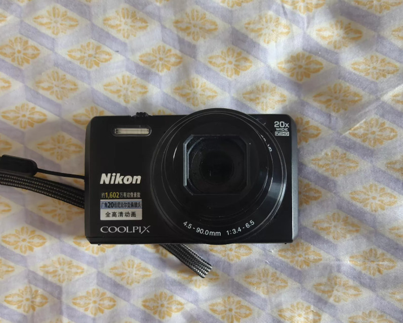 Nikon COOLPIX S7000 Digital Camera 16 MP 20x Optical Zoom English Language Black