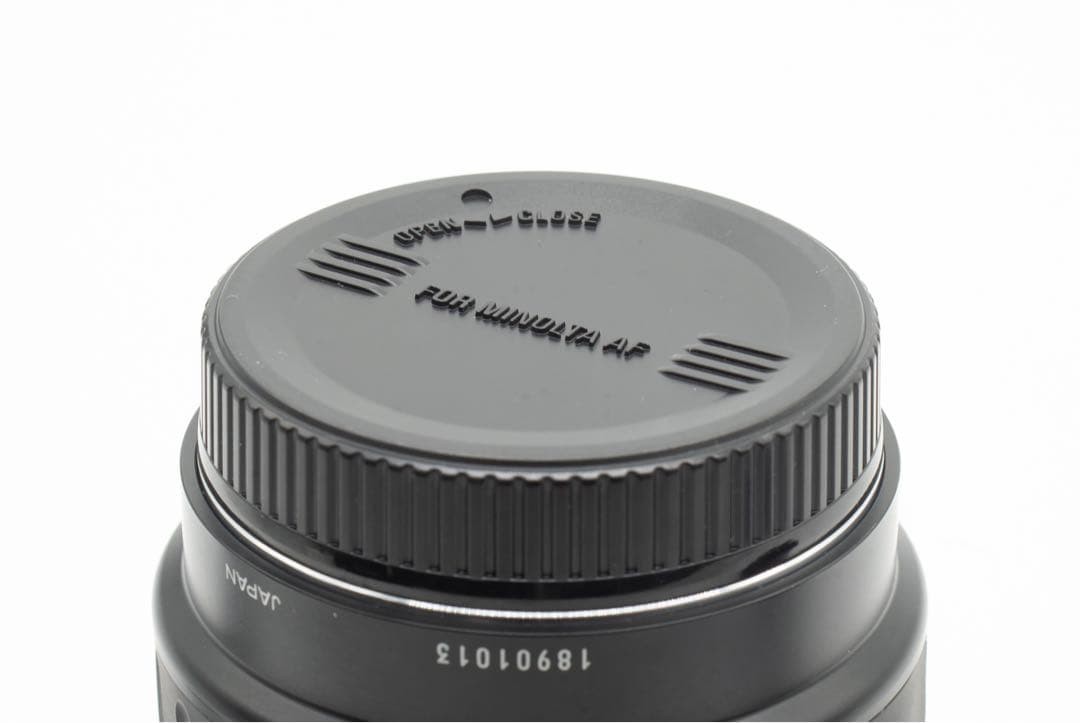 1-Month Warranty. Minolta 100 F2.8 Macro Lens. Functionality Checked.