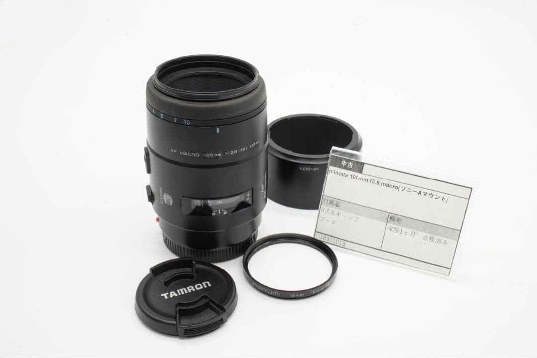 1-Month Warranty. Minolta 100 F2.8 Macro Lens. Functionality Checked.