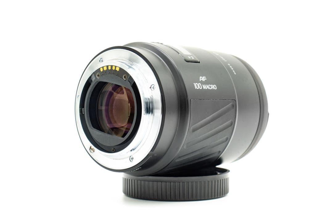 1-Month Warranty. Minolta 100 F2.8 Macro Lens. Functionality Checked.