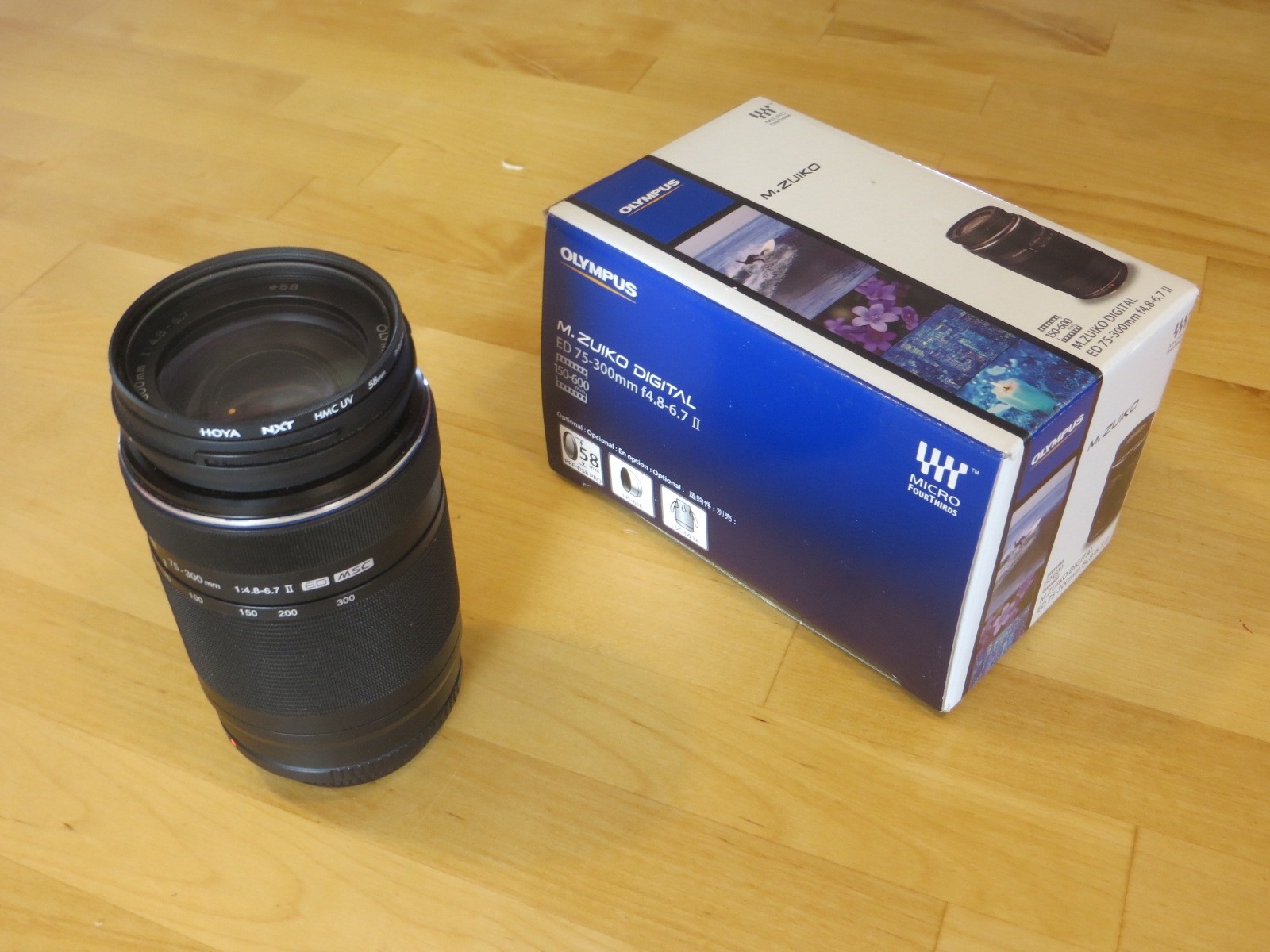 Olympus M.ZUIKO DIGITAL ED 75-300mm F4.8 – 6.7 II Lens with Extras