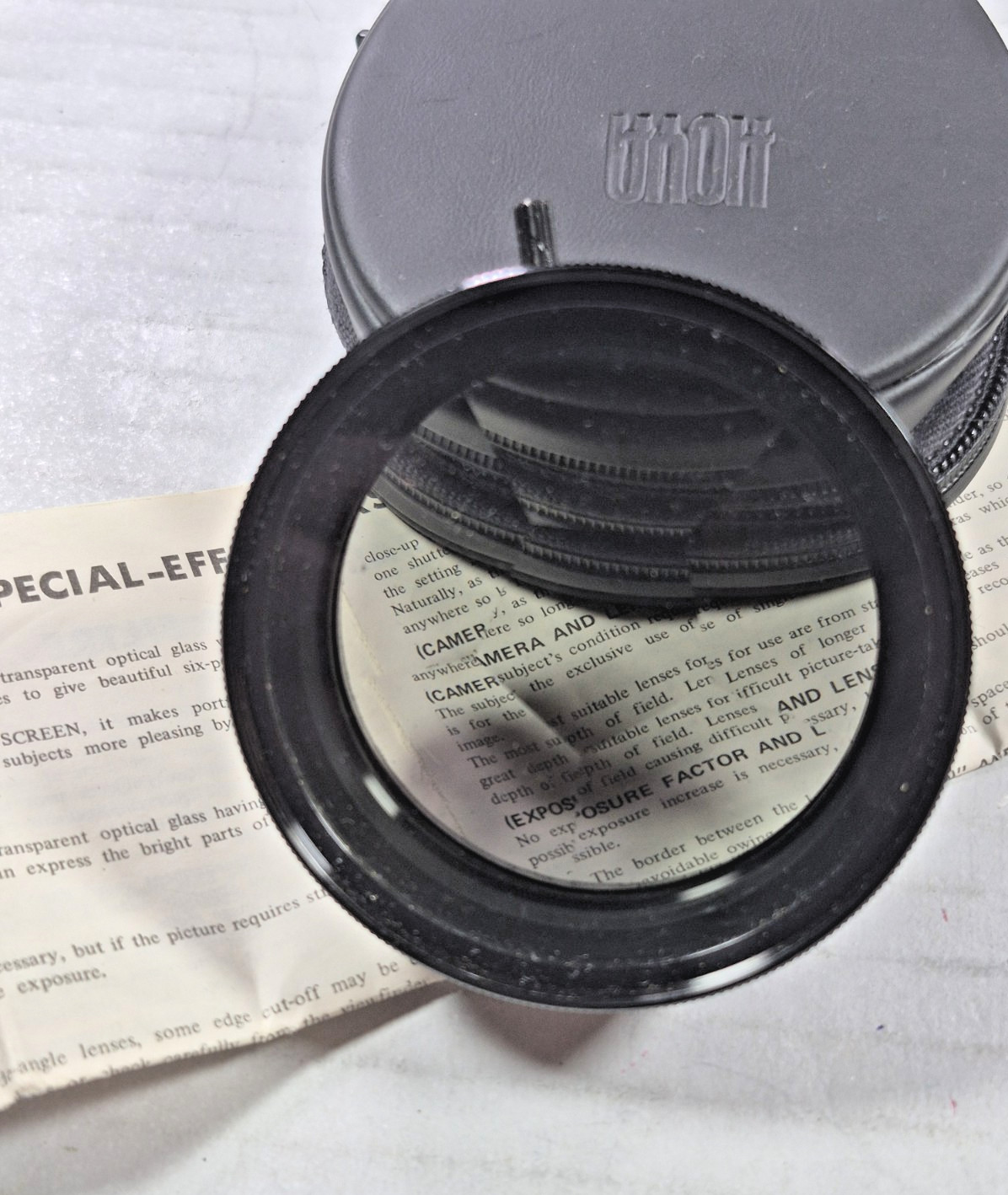 Miscellaneous used camera lens, filters, and empty cases plus misc. others